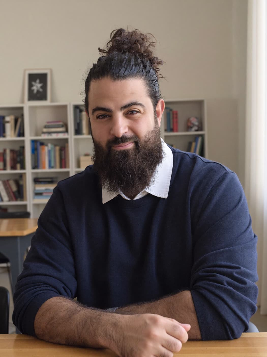 Mohamed El-Rafih, founder of My Tutor, seated at a desk